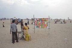 04-Shooting balloons on Sunday on the beach by the Shore Temple